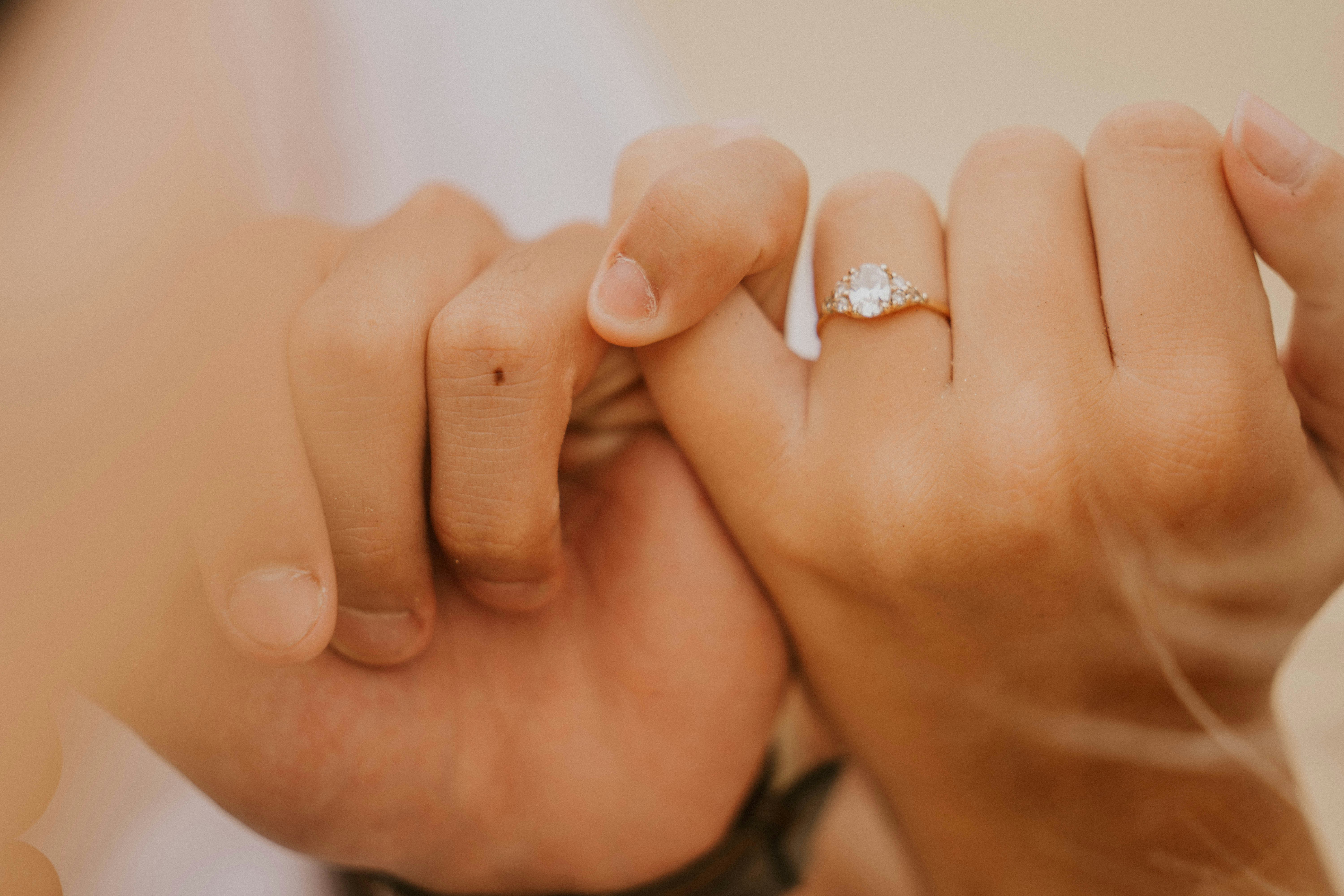 person holding babys hand